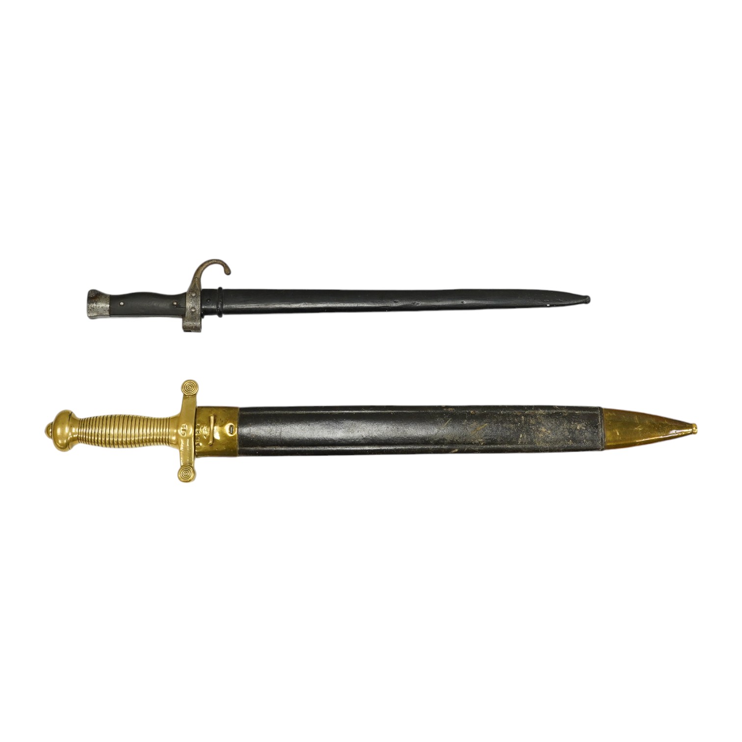 A 19th century French infantryman’s sidearm Gladius with swollen double edged blade, and regulation cast brass cruciform hilt, in its brass mounted leather scabbard, together with a continental bayonet also in scabbard.